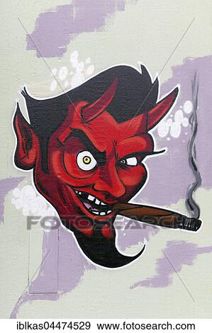 Red devil smoking cigar, graffiti, urban art, street art, Düsseldorf, North Rhine-Westphalia, Germany, Europe View Large Photo Image Stock Photo - Red devil smoking cigar, graffiti, urban art, street art, Düsseldorf, North Rhine-Westphalia, Germany, Europe. Fotosearch