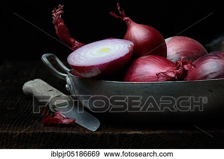 Red onions in skin, sliced, Allium cepa View Large Photo Image Stock Photo - Red onions in skin, sliced, Allium cepa. Fotosearch