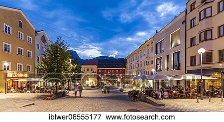 Stock Photo - Restaurants and shops in the evening, Lower town square, Shopping street, Old town, Kufstein, Tyrol, Austria, Europe. Fotosearch