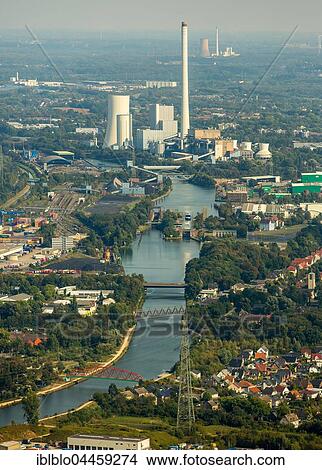 Rhine-Herne canal with STEAG coal power station between Gelsenkirchen and Herne, Ruhr district, North Rhine-Westphalia, Germany, Europe View Large Photo Image Picture - Rhine-Herne canal with STEAG coal power station between Gelsenkirchen and Herne, Ruhr district, North Rhine-Westphalia, Germany, Europe. Fotosearch