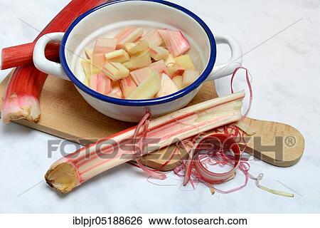 Stock Photograph - Rhubarb and rhubarb pieces in shell, Rheum rhabarbarum. Fotosearch