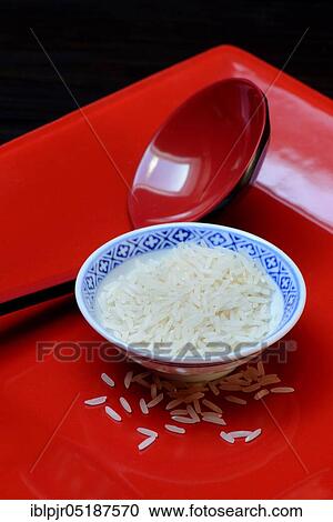 Rice grains in bowls and chopsticks, basmati rice View Large Photo Image Stock Image - Rice grains in bowls and chopsticks, basmati rice. Fotosearch