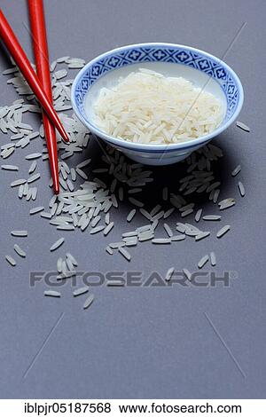 Rice grains in husk and chopsticks, basmati rice, Oryza sativa, uncooked View Large Photo Image Stock Photo - Rice grains in husk and chopsticks, basmati rice, Oryza sativa, uncooked. Fotosearch