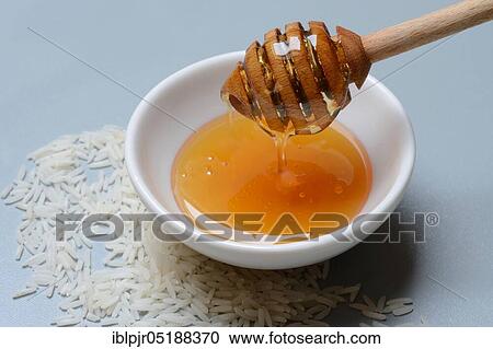 Rice syrup, rice syrup in husk and honey spoon, rice honey View Large Photo Image Stock Image - Rice syrup, rice syrup in husk and honey spoon, rice honey. Fotosearch