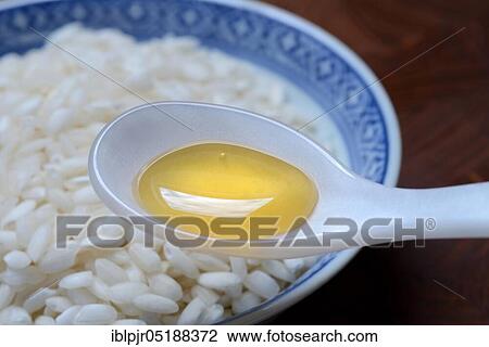 Rice syrup, rice syrup in spoon, rice in bowl, rice honey View Large Photo Image Stock Image - Rice syrup, rice syrup in spoon, rice in bowl, rice honey. Fotosearch
