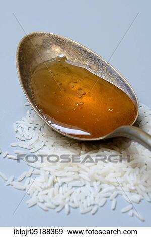 Rice syrup, rice syrup in spoon, rice honey View Large Photo Image Stock Photo - Rice syrup, rice syrup in spoon, rice honey. Fotosearch
