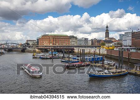 Stock Photography - River port with boats, behind Saint Michael's Church, Hamburg, Germany, Europe. Fotosearch