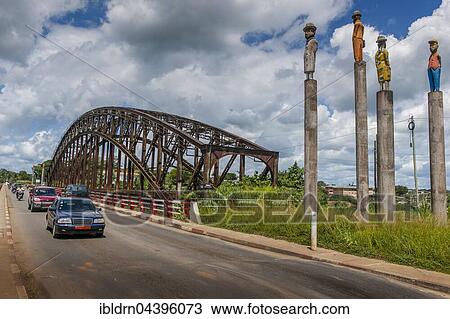 Road next to the old bridge, former railway bridge over the river Sanaga from the German colonial era, Edéa, Littoral Region, Cameroon, Africa View Large Photo Image Stock Image - Road next to the old bridge, former railway bridge over the river Sanaga from the German colonial era, Edéa, Littoral Region, Cameroon, Africa. Fotosearch