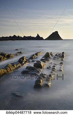 Rocks in the sea, rocky coast, Atlantic Coast, Hartland Quay, Devon, United Kingdom, Europe View Large Photo Image Stock Photo - Rocks in the sea, rocky coast, Atlantic Coast, Hartland Quay, Devon, United Kingdom, Europe. Fotosearch