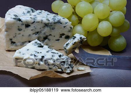 Stock Photo - Roquefort, blue cheese, grapes. Fotosearch