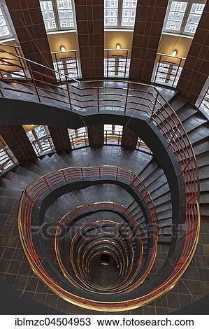 Round staircase in Kontor building Sprinkenhof, Hamburg, Germany, Europe View Large Photo Image Stock Image - Round staircase in Kontor building Sprinkenhof, Hamburg, Germany, Europe. Fotosearch