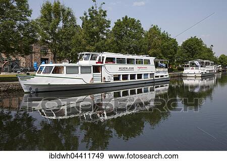 Stock Photo - Ruhrschifffahrt white fleet, Wasserbahnhof, river port, sluice, Mülheim an der Ruhr, Ruhr district, North Rhine-Westphalia, Germany, Europe. Fotosearch