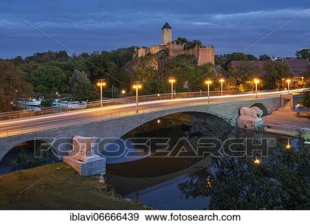 Stock Photo - Ruin of Giebichenstein Castle and Giebichenstein Bridge over the river Saale, dusk, Halle an der Saale, Saxony-Anhalt, Germany, Europe. Fotosearch