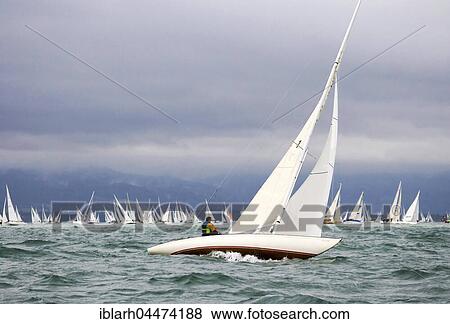 Sailing regatta Rund Um, various sailboats, clouded sky, Lake Constance, Lindau, Bavaria, Germany, Europe View Large Photo Image Stock Photo - Sailing regatta Rund Um, various sailboats, clouded sky, Lake Constance, Lindau, Bavaria, Germany, Europe. Fotosearch