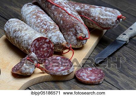 Salami, sausage with knife, Italy, Europe View Large Photo Image Stock Image - Salami, sausage with knife, Italy, Europe. Fotosearch