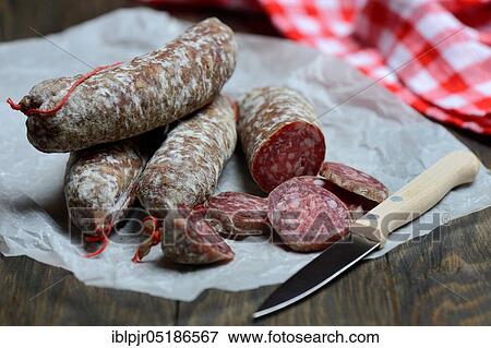 Salami, sausage with knife, Italy, Europe View Large Photo Image Stock Photo - Salami, sausage with knife, Italy, Europe. Fotosearch