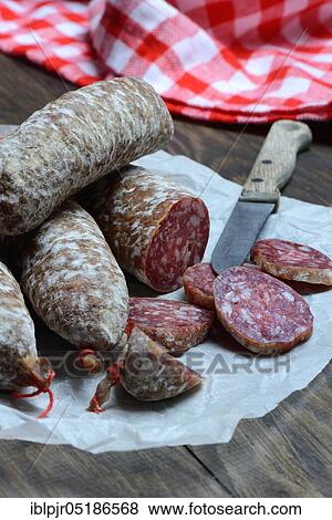 Salami, sausage with knife, Italy, Europe View Large Photo Image Stock Photo - Salami, sausage with knife, Italy, Europe. Fotosearch