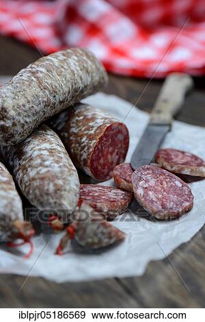 Salami, sausage with knife, Italy, Europe View Large Photo Image Stock Photo - Salami, sausage with knife, Italy, Europe. Fotosearch