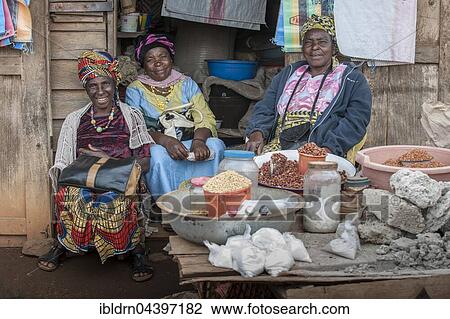 Saleswomen sitting at market stall, Fundong, Northwest Region, Cameroon, Africa View Large Photo Image Stock Image - Saleswomen sitting at market stall, Fundong, Northwest Region, Cameroon, Africa. Fotosearch