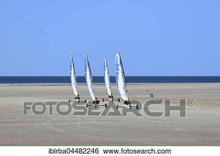 Sand sailors ride on the beach, Sankt Peter-Ording, Schleswig-Holstein Wadden Sea National Park, North Frisia, Schleswig-Holstein, Germany, Europe View Large Photo Image Stock Photograph - Sand sailors ride on the beach, Sankt Peter-Ording, Schleswig-Holstein Wadden Sea National Park, North Frisia, Schleswig-Holstein, Germany, Europe. Fotosearch