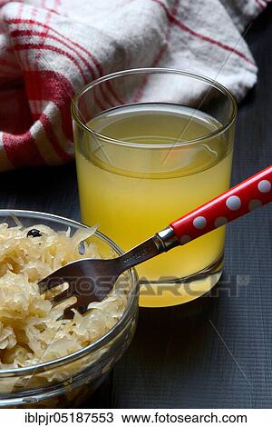 Sauerkraut and sauerkraut juice in glass View Large Photo Image Stock Image - Sauerkraut and sauerkraut juice in glass. Fotosearch