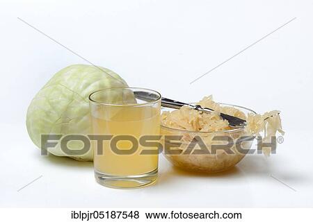 Sauerkraut and sauerkraut juice in glass, white cabbage View Large Photo Image Stock Photo - Sauerkraut and sauerkraut juice in glass, white cabbage. Fotosearch