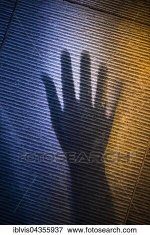 Scary shadow of human hand on stone surface View Large Photo Image Stock Photo - Scary shadow of human hand on stone surface. Fotosearch