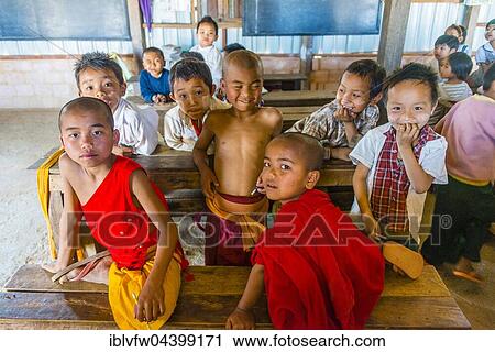 School children sitting at their desks, classroom, Shan State, Myanmar, Asia View Large Photo Image Stock Image - School children sitting at their desks, classroom, Shan State, Myanmar, Asia. Fotosearch