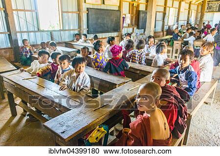 School children sitting at their desks, classroom, Shan State, Myanmar, Asia View Large Photo Image Stock Image - School children sitting at their desks, classroom, Shan State, Myanmar, Asia. Fotosearch