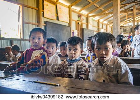 School children sitting at their desks, classroom, Shan State, Myanmar, Asia View Large Photo Image Stock Image - School children sitting at their desks, classroom, Shan State, Myanmar, Asia. Fotosearch