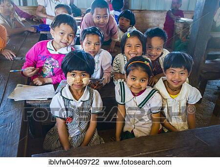 School children sitting at their desks, classroom, Shan State, Myanmar, Asia View Large Photo Image Stock Image - School children sitting at their desks, classroom, Shan State, Myanmar, Asia. Fotosearch