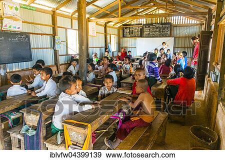 School children sitting at their desks, classroom, Shan State, Myanmar, Asia View Large Photo Image Stock Photo - School children sitting at their desks, classroom, Shan State, Myanmar, Asia. Fotosearch