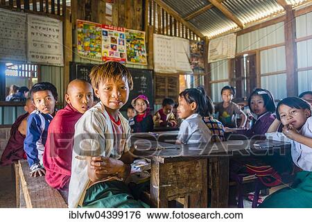 School children sitting at their desks, classroom, Shan State, Myanmar, Asia View Large Photo Image Stock Photograph - School children sitting at their desks, classroom, Shan State, Myanmar, Asia. Fotosearch