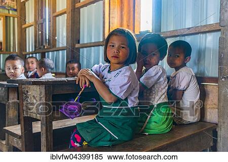 School children sitting at their desks, classroom, Shan State, Myanmar, Asia View Large Photo Image Stock Photography - School children sitting at their desks, classroom, Shan State, Myanmar, Asia. Fotosearch