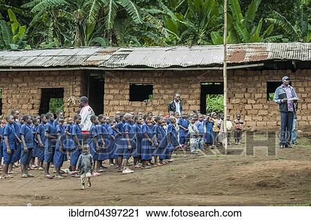 Schoolchildren in uniforms, schoolyard, Foumbam, West Region, Cameroon, Africa View Large Photo Image Stock Image - Schoolchildren in uniforms, schoolyard, Foumbam, West Region, Cameroon, Africa. Fotosearch
