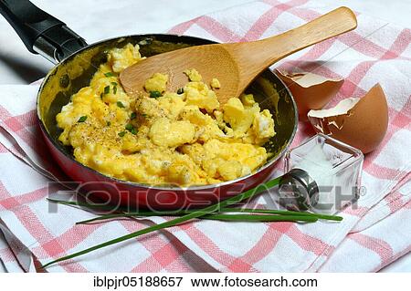 Scrambled eggs in frying pan, frying pan, egg dish, egg dishes, egg shell View Large Photo Image Stock Photo - Scrambled eggs in frying pan, frying pan, egg dish, egg dishes, egg shell. Fotosearch