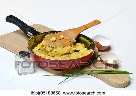 Scrambled eggs in frying pan, frying pan, egg dish, egg dishes, egg shell View Large Photo Image Stock Photo - Scrambled eggs in frying pan, frying pan, egg dish, egg dishes, egg shell. Fotosearch