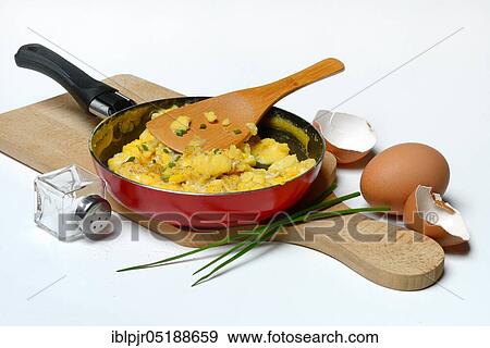 Scrambled eggs in frying pan, frying pan, egg dish, egg dishes, egg shell View Large Photo Image Stock Photo - Scrambled eggs in frying pan, frying pan, egg dish, egg dishes, egg shell. Fotosearch