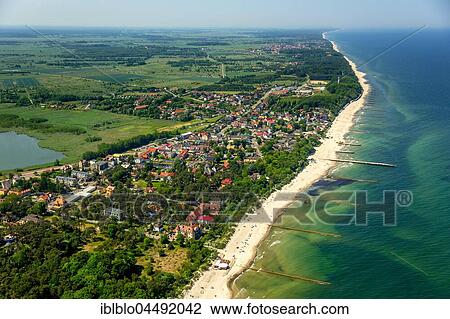 Seaside resort Niechorze, long sandy beach, The Baltic Coast, West Pomerania Province, Poland, Europe View Large Photo Image Stock Image - Seaside resort Niechorze, long sandy beach, The Baltic Coast, West Pomerania Province, Poland, Europe. Fotosearch