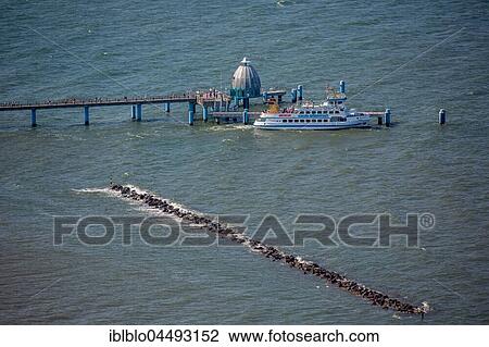 Stock Image - Sellin pier with excursion boat, Rügen, Baltic Sea, Mecklenburg-Western Pomerania, Germany, Europe. Fotosearch