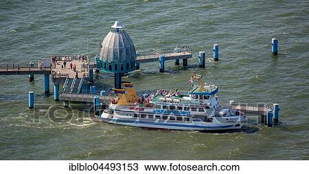 Sellin pier with excursion boat, Rügen, Baltic Sea, Mecklenburg-Western Pomerania, Germany, Europe View Large Photo Image Stock Image - Sellin pier with excursion boat, Rügen, Baltic Sea, Mecklenburg-Western Pomerania, Germany, Europe. Fotosearch