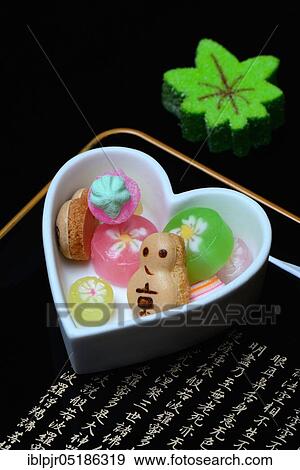 Stock Photo - shi, Japanese sweets in heart-shaped bowls, candy, sweets. Fotosearch
