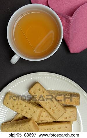 Shortbread, Shortbread Fingers and cup of tea, English butter baked, Tea Time View Large Photo Image Stock Photo - Shortbread, Shortbread Fingers and cup of tea, English butter baked, Tea Time. Fotosearch