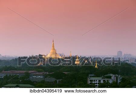 Shwedagon pagoda at sunset, Yangon, Myanmar, Asia View Large Photo Image Stock Photo - Shwedagon pagoda at sunset, Yangon, Myanmar, Asia. Fotosearch