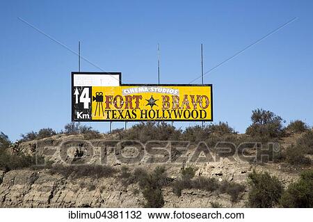 Stock Image - Sign advertising Fort Bravo Texas Hollywood, cinema studios, tourist attraction, Tabernas, Almeria, Spain, Europe. Fotosearch
