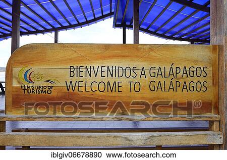 Stock Image - Sign at the ferry terminal Baltra, Welcome to Galapagos, Santa Cruz Island, Galapagos, Ecuador, South America. Fotosearch