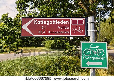 Signpost with pictogram bicycle for Swedish cycling routes Kattegattleden and Sverigeleden, Halland, Sweden, Europe View Large Photo Image Stock Photography - Signpost with pictogram bicycle for Swedish cycling routes Kattegattleden and Sverigeleden, Halland, Sweden, Europe. Fotosearch