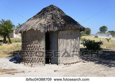 Stock Photo - Simple thatched hut, Khwai Village, Botswana, Africa. Fotosearch