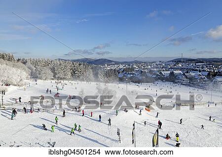 Skier on ski slope, Winterberg, Sauerland, North Rhine-Westphalia ski resort, Germany, Europe View Large Photo Image Picture - Skier on ski slope, Winterberg, Sauerland, North Rhine-Westphalia ski resort, Germany, Europe. Fotosearch