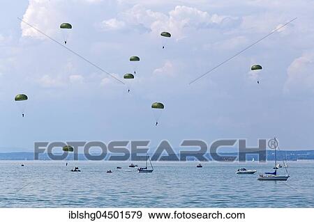 Skydivers near Langenargen, Lake Constance, Baden-Württemberg, Germany, Europe View Large Photo Image Stock Photo - Skydivers near Langenargen, Lake Constance, Baden-Württemberg, Germany, Europe. Fotosearch